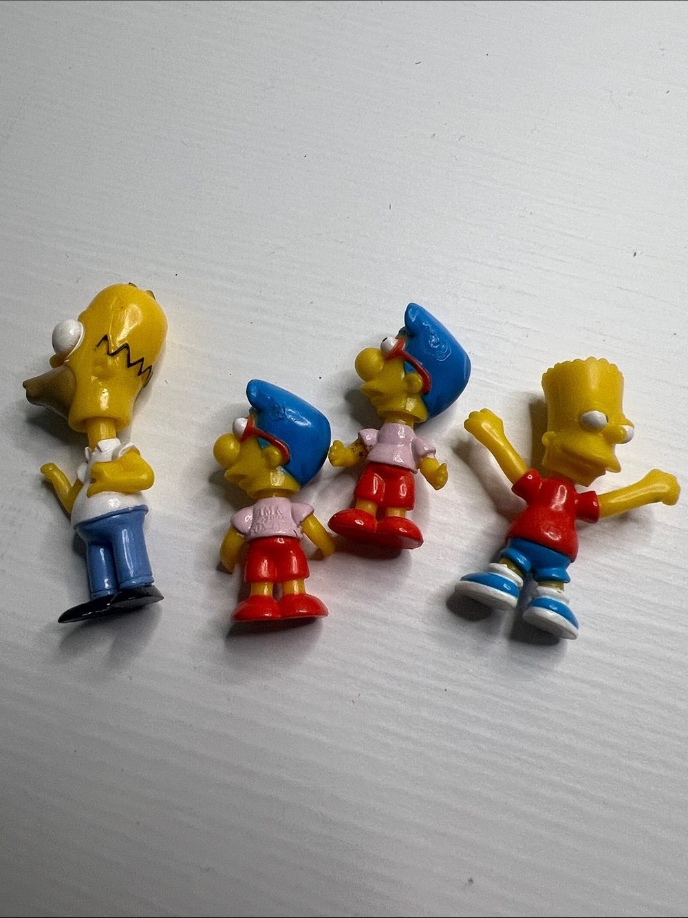The Simpsons Cartoon Character Toy Figures - Pack of 4 Bart Homer Milhouse